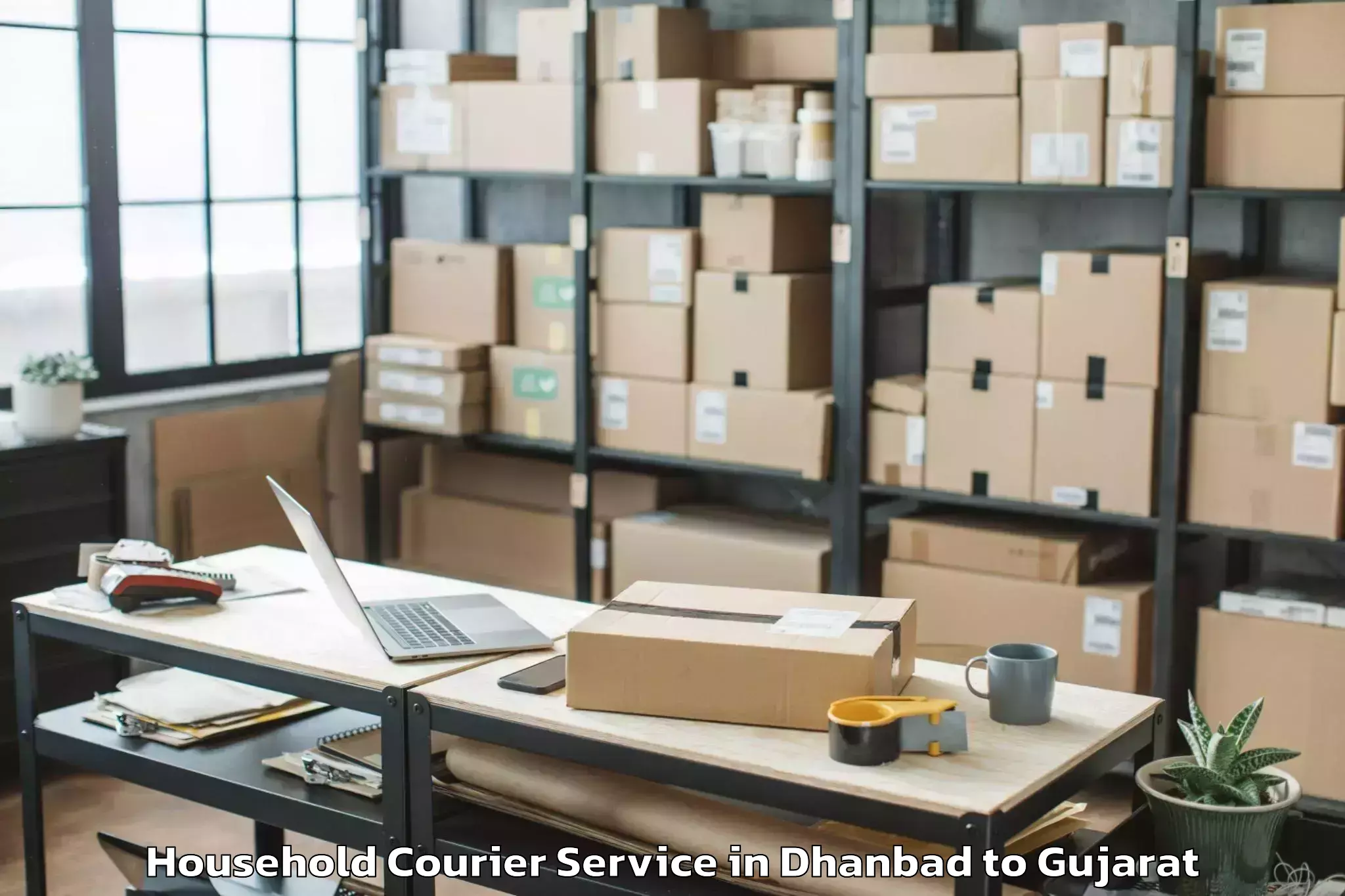 Trusted Dhanbad to Chalala Household Courier